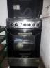 Four burner gas cooker with oven